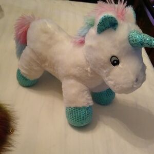 Plush Unicorn Toy with Blue and Pink Accents